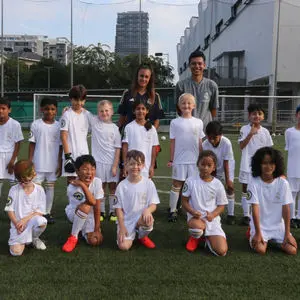 Squad photograph with the coaching team